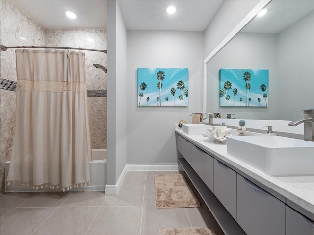 1911 Greenbriar Ter, Davenport, FL 33837 - full bath with shower / tub combo, double vanity, a sink, and baseboards