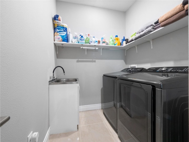 1911 Greenbriar Ter, Davenport, FL 33837 - washroom featuring baseboards, laundry area, a sink, and washing machine and dryer