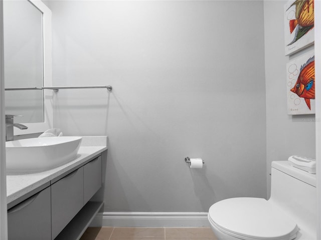 1911 Greenbriar Ter, Davenport, FL 33837 - half bathroom with toilet, vanity, and baseboards