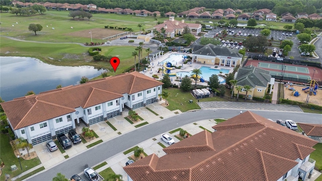 1911 Greenbriar Ter, Davenport, FL 33837 - drone / aerial view featuring a water view, golf course view, and a residential view