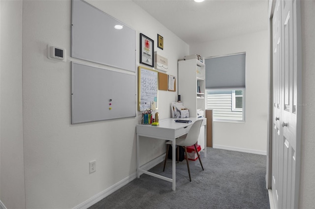 home office featuring baseboards and carpet floors