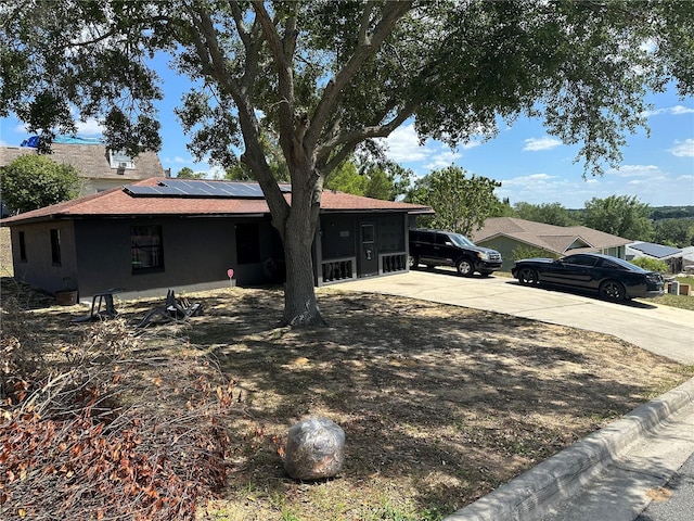 exterior space with solar panels