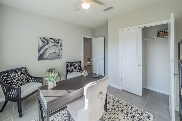 848 San Pedro Ct, Kissimmee, FL 34758 - tiled home office with visible vents, ceiling fan, and baseboards