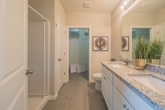 848 San Pedro Ct, Kissimmee, FL 34758 - full bathroom featuring walk in shower, tile patterned floors, double vanity, and a sink