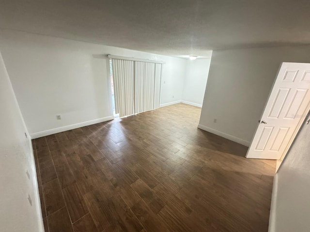 4745 S Texas Ave Unit A, Orlando, FL 32839 - spare room featuring dark wood-type flooring and baseboards