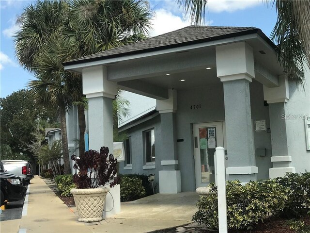 4745 S Texas Ave Unit A, Orlando, FL 32839 - property entrance with stucco siding