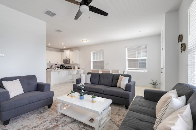 2412 Good Will Aly, Kissimmee, FL 34744 - living area featuring light tile patterned floors, ceiling fan, visible vents, and recessed lighting