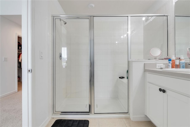 2412 Good Will Aly, Kissimmee, FL 34744 - bathroom with a shower stall, vanity, and baseboards