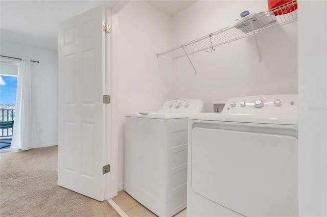 2412 Good Will Aly, Kissimmee, FL 34744 - laundry room with independent washer and dryer, laundry area, and light carpet