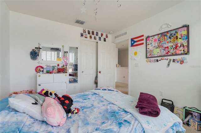 2412 Good Will Aly, Kissimmee, FL 34744 - carpeted bedroom with visible vents