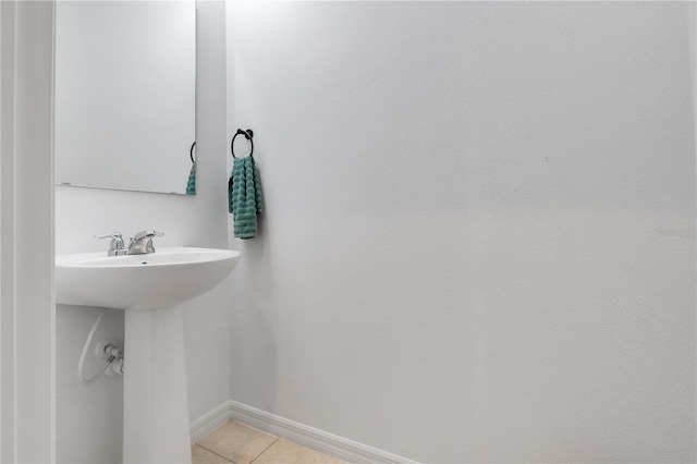 2412 Good Will Aly, Kissimmee, FL 34744 - bathroom with tile patterned floors and baseboards