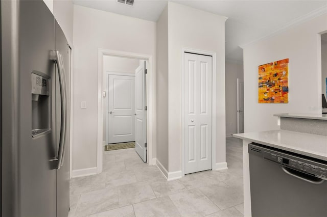 kitchen featuring light countertops, crown molding, stainless steel refrigerator with ice dispenser, visible vents, and dishwasher