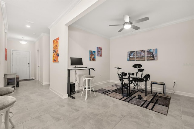 dining space featuring baseboards, crown molding, and a ceiling fan