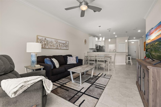 living room featuring a ceiling fan, ornamental molding, visible vents, and recessed lighting