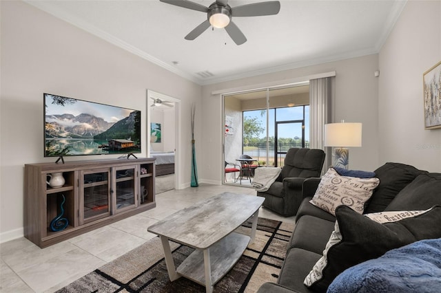 living area with ornamental molding, baseboards, a ceiling fan, and visible vents
