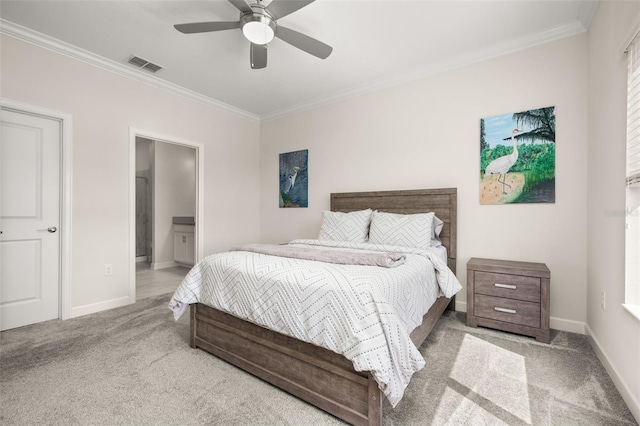 bedroom with crown molding, carpet flooring, baseboards, and visible vents