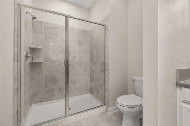 full bath with toilet and a shower stall