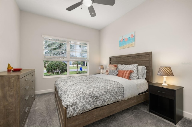 carpeted bedroom with baseboards and a ceiling fan
