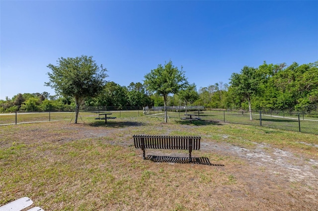 surrounding community featuring fence