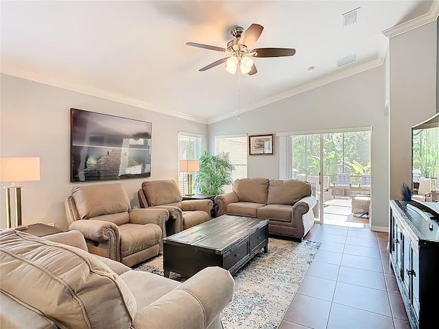 524 Grand Canal Dr, Poinciana, FL 34759 - living room with plenty of natural light, vaulted ceiling, a ceiling fan, and dark tile patterned flooring