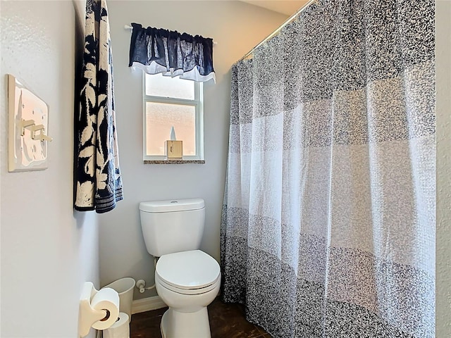 524 Grand Canal Dr, Poinciana, FL 34759 - full bath featuring toilet, a shower with curtain, and baseboards