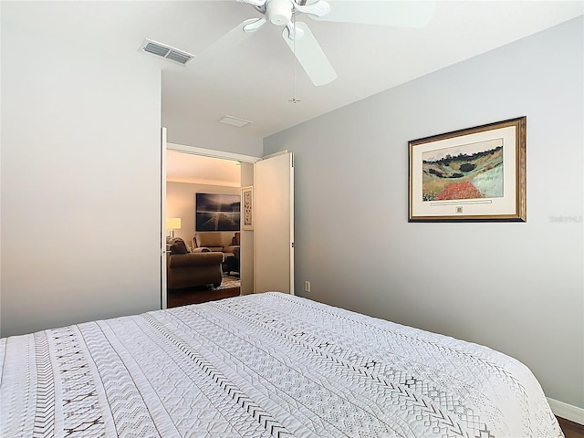 524 Grand Canal Dr, Poinciana, FL 34759 - bedroom with visible vents and a ceiling fan