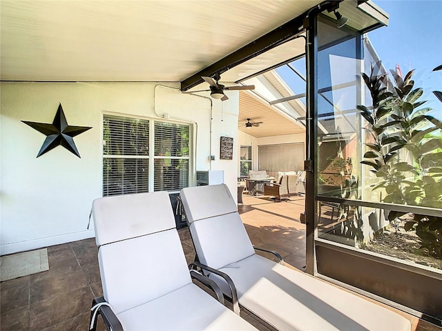 524 Grand Canal Dr, Poinciana, FL 34759 - view of patio featuring outdoor dining space, glass enclosure, and a ceiling fan