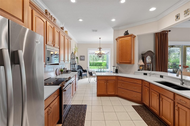 133 Torino Ln, Kissimmee, FL 34759 - kitchen with appliances with stainless steel finishes, ornamental molding, light countertops, recessed lighting, and a chandelier
