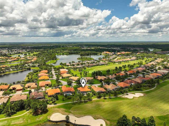133 Torino Ln, Kissimmee, FL 34759 - aerial perspective of suburban area with a nearby body of water and a local golf course