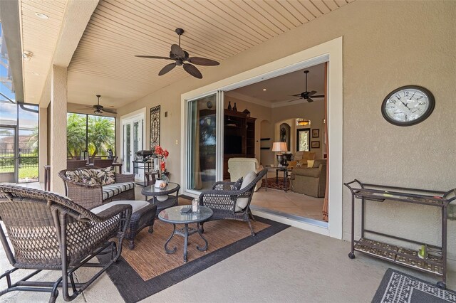133 Torino Ln, Kissimmee, FL 34759 - view of patio featuring ceiling fan and an outdoor hangout area
