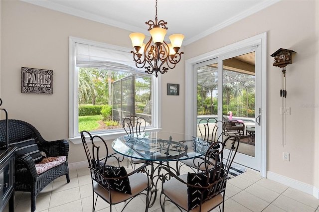 133 Torino Ln, Kissimmee, FL 34759 - dining room featuring light tile patterned floors, a chandelier, and ornamental molding