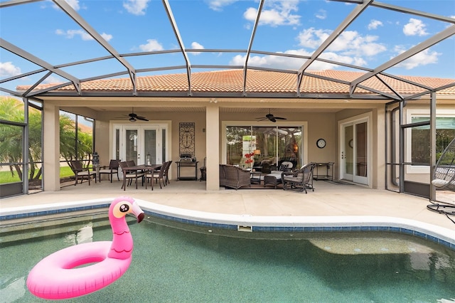 133 Torino Ln, Kissimmee, FL 34759 - rear view of house featuring a ceiling fan, stucco siding, and a patio area
