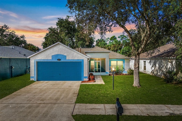 1560 Vista Lake Cir, Melbourne, FL 32904 - single story home featuring a yard, an attached garage, concrete driveway, and stucco siding