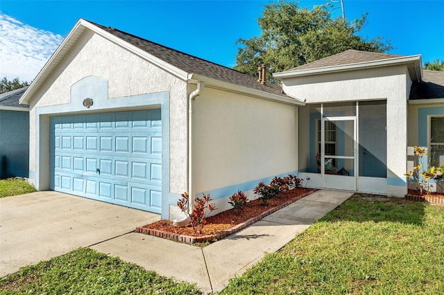 1560 Vista Lake Cir, Melbourne, FL 32904 - view of property exterior featuring concrete driveway, an attached garage, a shingled roof, and stucco siding
