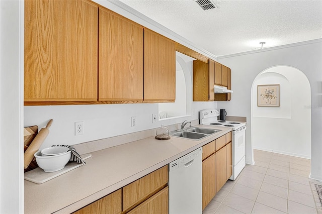 1560 Vista Lake Cir, Melbourne, FL 32904 - kitchen featuring white appliances, visible vents, under cabinet range hood, light countertops, and a sink