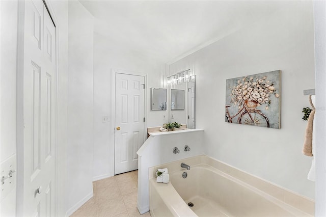 1560 Vista Lake Cir, Melbourne, FL 32904 - bathroom with tile patterned floors and a bath