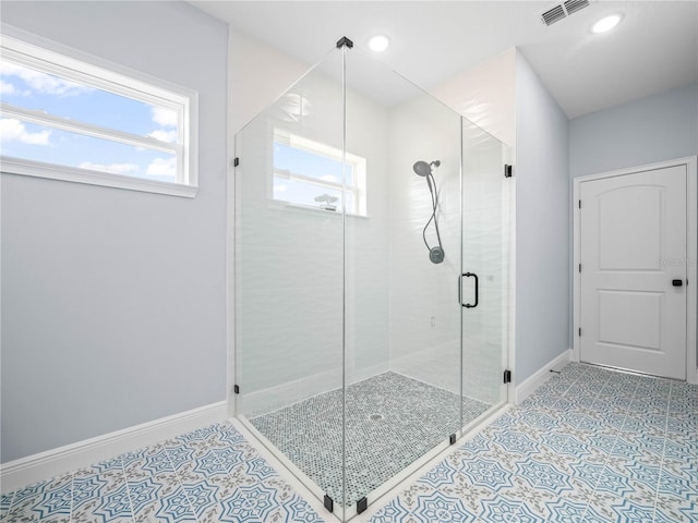 145 Willow Dr, Poinciana, FL 34759 - bathroom with a shower stall, visible vents, recessed lighting, tile patterned floors, and baseboards