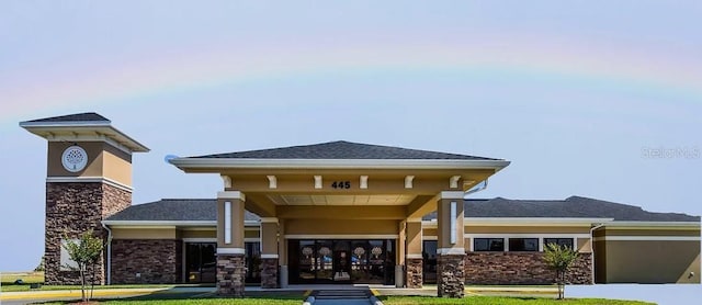 145 Willow Dr, Poinciana, FL 34759 - view of building exterior featuring a garage and concrete driveway