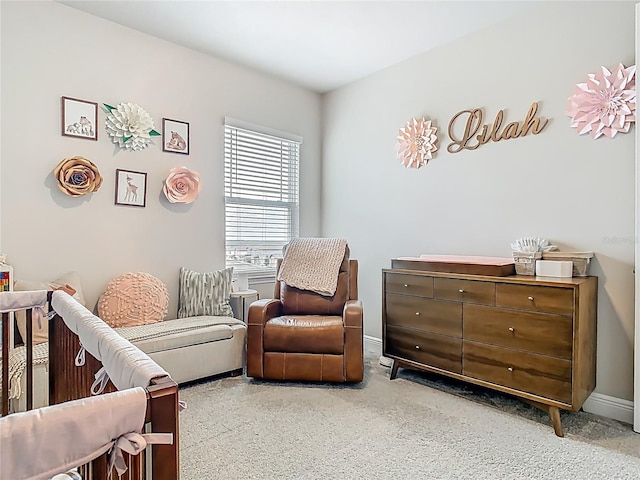 bedroom featuring speckled floor and baseboards