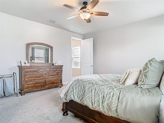 bedroom featuring carpet, visible vents, and ceiling fan