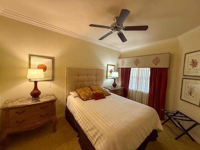 bedroom featuring crown molding, carpet flooring, and a ceiling fan