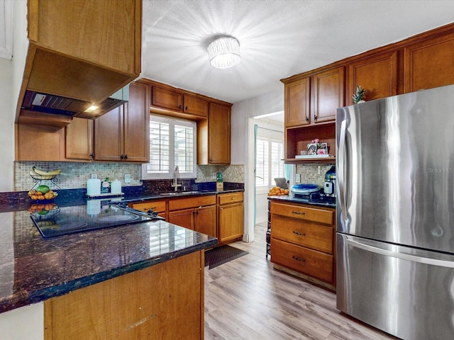 5123 Lighthouse Rd, Orlando, FL 32808 - kitchen with freestanding refrigerator, open shelves, a sink, backsplash, and light wood-type flooring