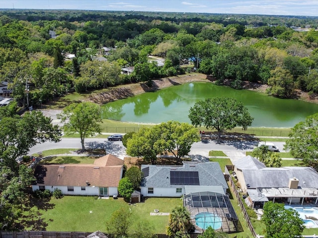 5123 Lighthouse Rd, Orlando, FL 32808 - drone / aerial view of a nearby body of water, a pool area, and a forest