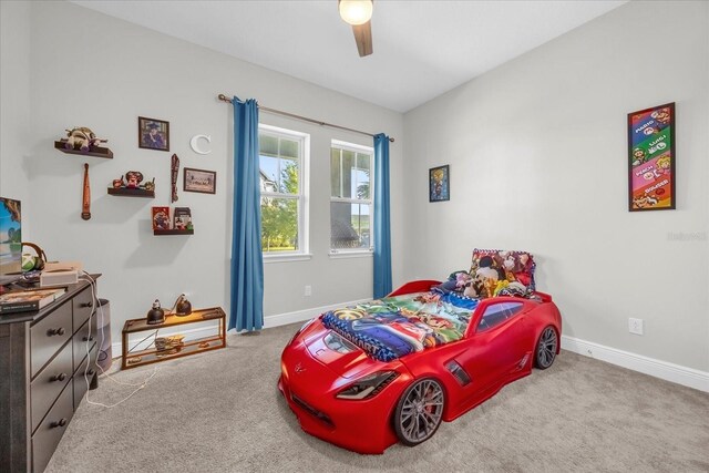 8338 Modiano St, Orlando, FL 32827 - carpeted bedroom featuring baseboards and ceiling fan