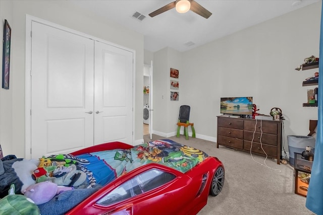 8338 Modiano St, Orlando, FL 32827 - carpeted bedroom with baseboards, a ceiling fan, a closet, and visible vents