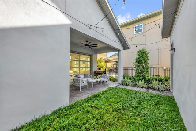 8338 Modiano St, Orlando, FL 32827 - view of yard featuring an outdoor living space, ceiling fan, a patio area, and fence