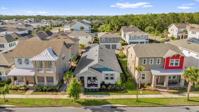 8338 Modiano St, Orlando, FL 32827 - drone / aerial view featuring a residential view