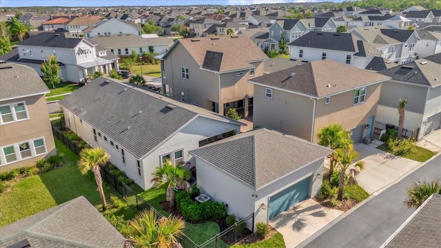 8338 Modiano St, Orlando, FL 32827 - drone / aerial view with a residential view