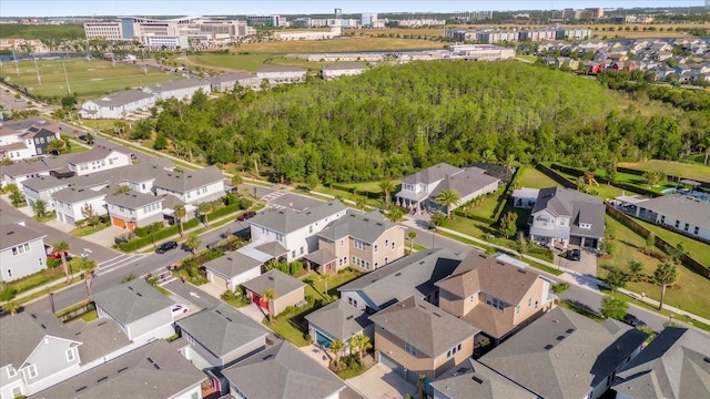 8338 Modiano St, Orlando, FL 32827 - drone / aerial view featuring a residential view