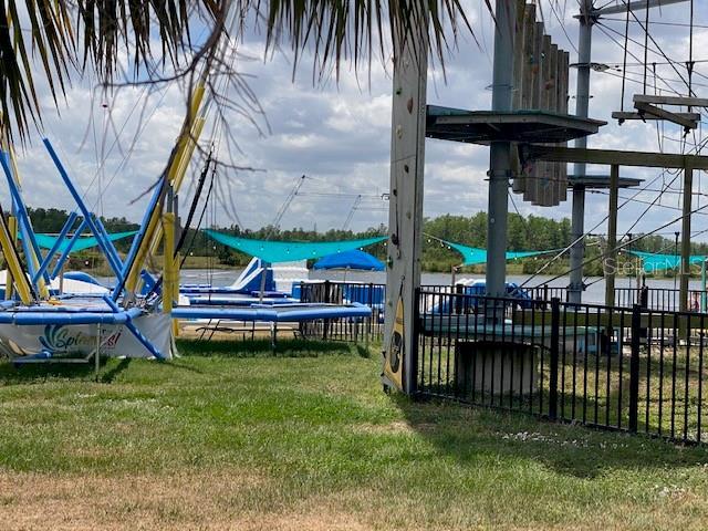 8338 Modiano St, Orlando, FL 32827 - view of yard featuring fence